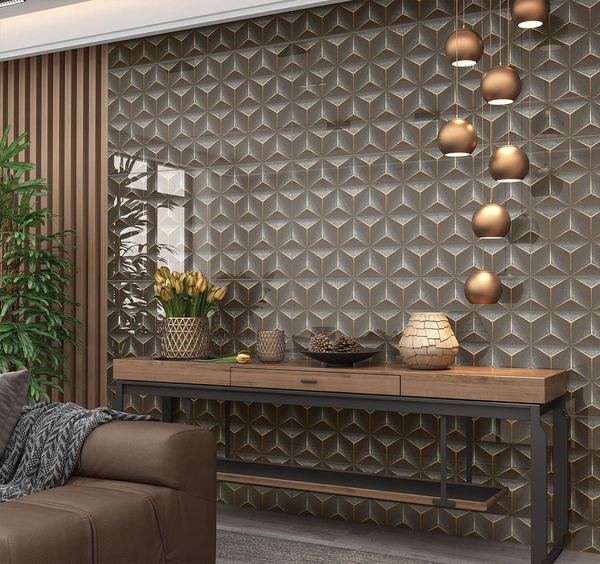 Parede revestida com placas decorativas de relevo geometrico