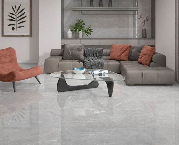 Sala de estar com piso cinza claro polido e sofa em L